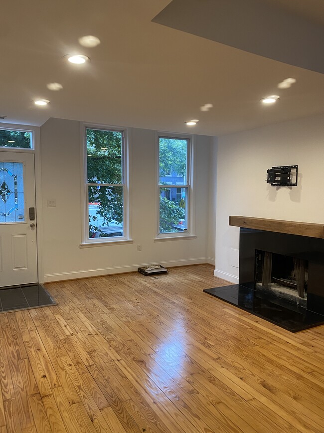 Living room with fireplace - 112 15th St SE