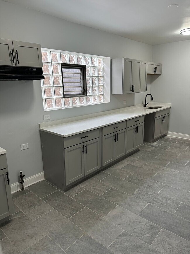 Building Photo - 8040 S Langley Ave