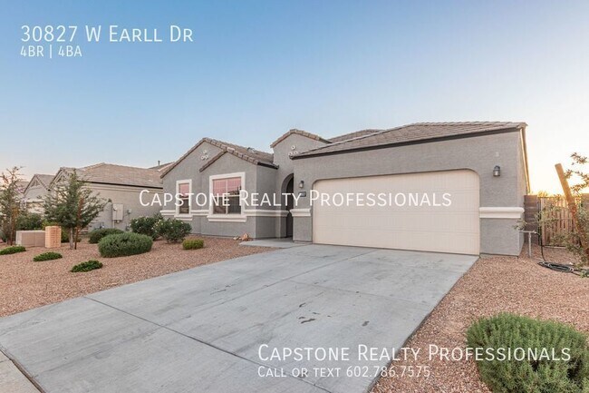 Foto del edificio - Uncover Your Ideal Residence: A 4-Bedroom ...