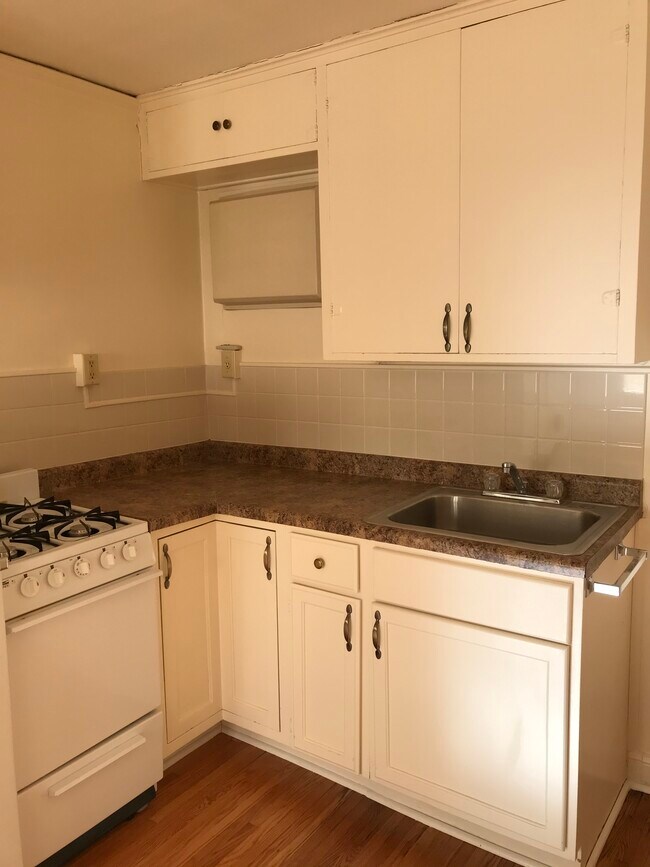 kitchen - sink and cabinets - 1522 Saint Clair Ave