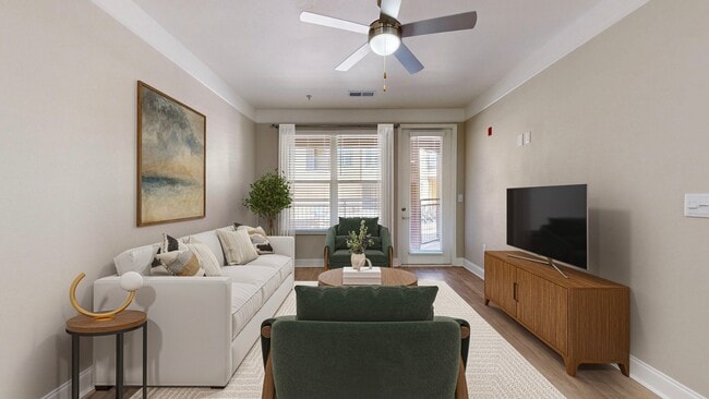 Bright and Airy Living Room with Hardwood Style Flooring - The Retreat at Quail North Apartments