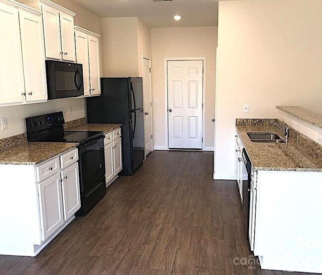 Building Photo - 7210 Cuddington Dr