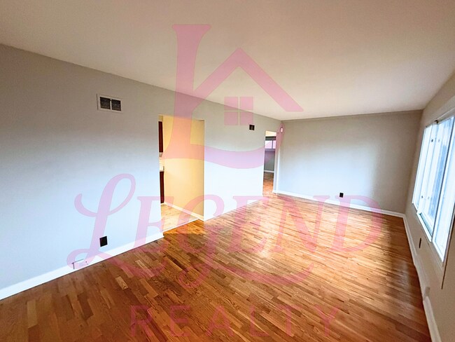 Building Photo - Charming 3-Bedroom Home with Hardwood Floors, Updates & Fenced Yard.