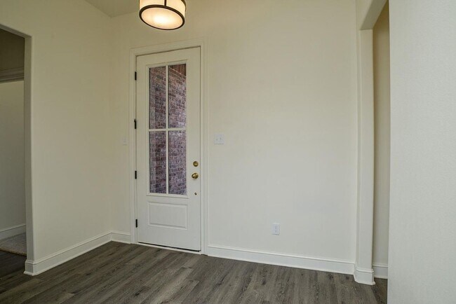 Building Photo - Available Now! Show Stopping New Construct...