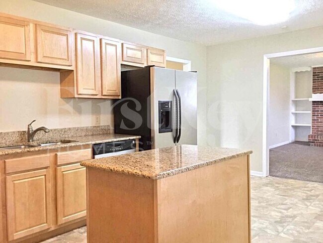 Foto del edificio - 10730 E 56th St