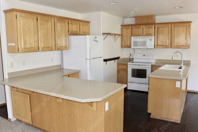 Foto del edificio - 3182 NW Quiet River Ln