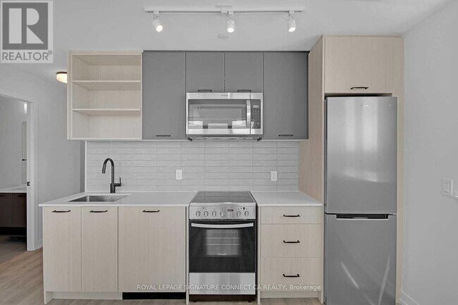 Building Photo - 2300 St Clair Ave W
