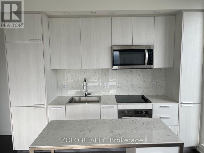 Building Photo - 75-PH375 Canterbury Pl