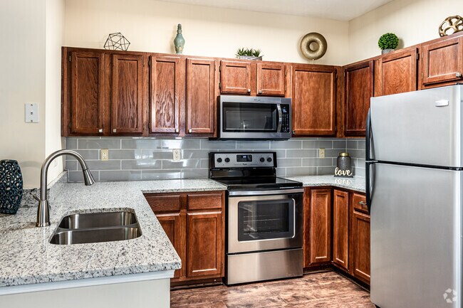 1 HAB, 1 BA - 940 ft² - The Woods of Cherry Creek Apartment Homes