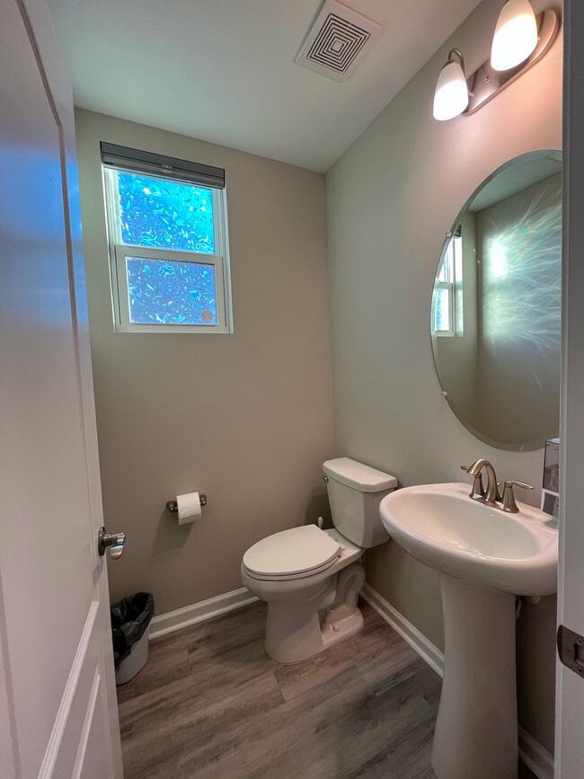 Downstairs half bath - 117 Goldenrod Cir