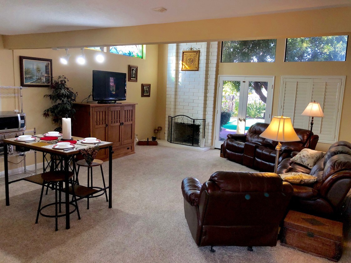 Living room and dining - 734 Inspiration Ln