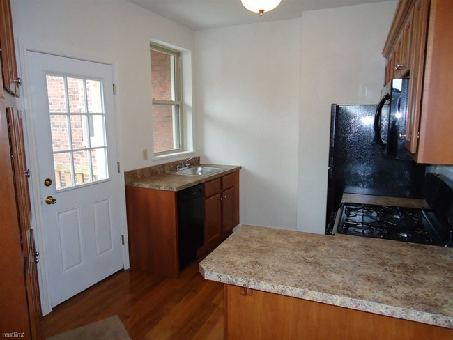 Building Photo - 4 br, 2 bath Townhome - 5535 Beeler Street