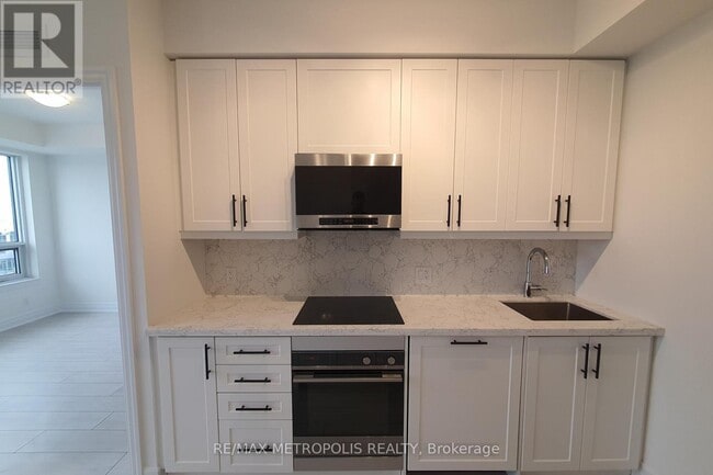 Photo du bâtiment - 30 Elm Dr W