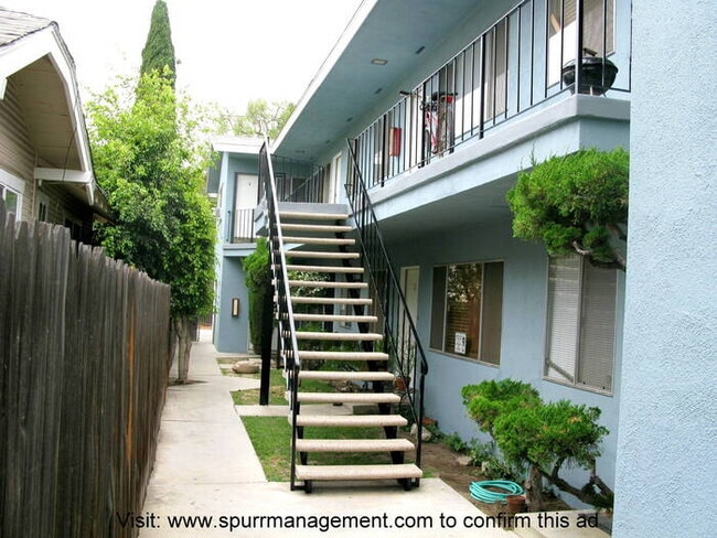 Foto del edificio - 1 BEDROOM APARTMENT WITH 1 CAR PRIVATE GARAGE