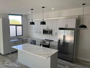 Building Photo - 7440 E Cave Creek Rd