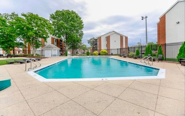 Building Photo - Welcome to Hampton Club – a gated community offering comfort, convenience, and peace of mind!