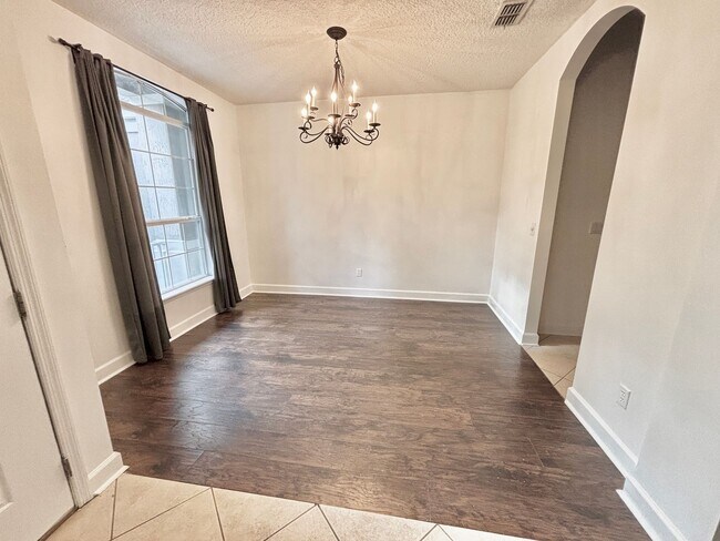 Building Photo - 4 Bed, 3 Bath, Corner Lot Home with Lanai, Fireplace, and Plenty of Community Amenities! Waived A...