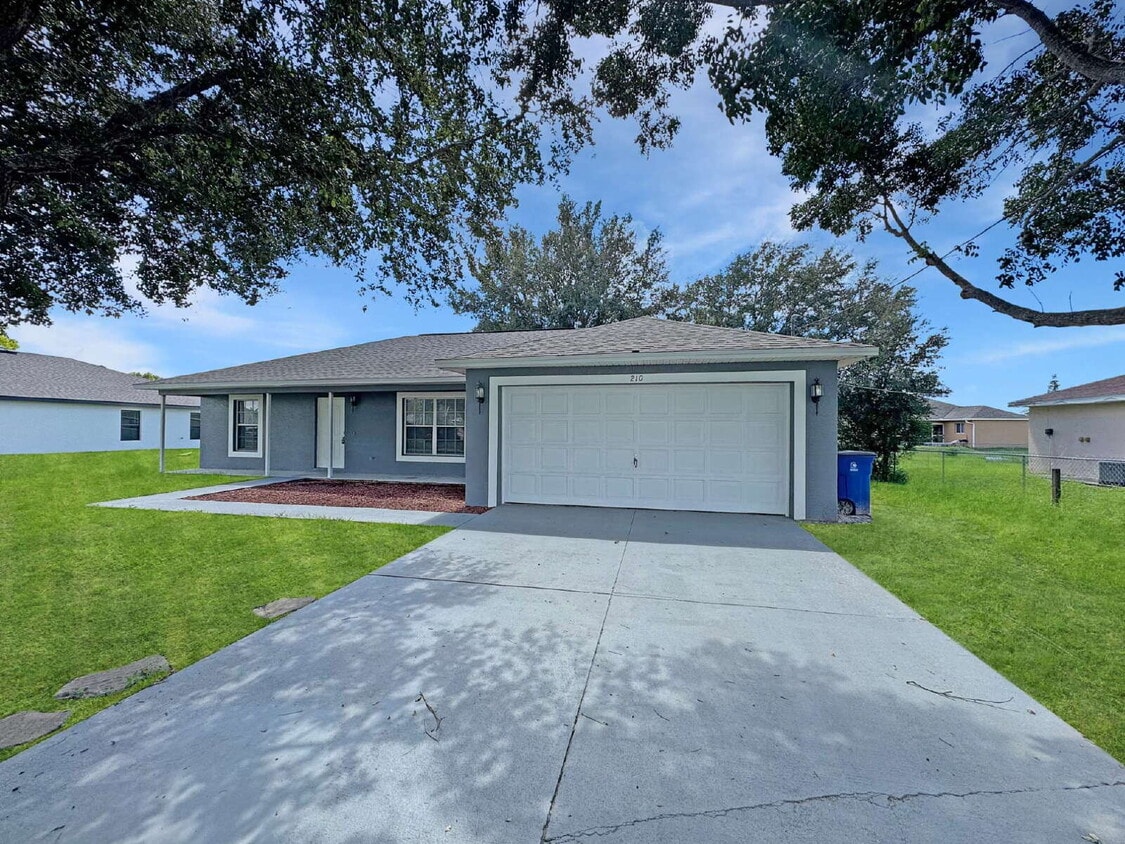 Photo - Fall in love with 210 Manatee St! This stunning 3-bed, 2-bath home boasts new kitchen appliances, a