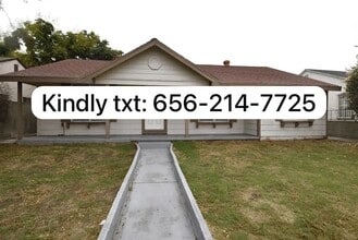 Building Photo - 10831 Rosecrans Ave