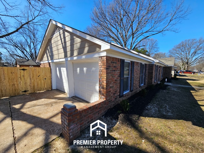 Photo - Newly Renovated 4BR Memphis Home | Brick Fireplace, 2-Car Garage & Fenced Backyard