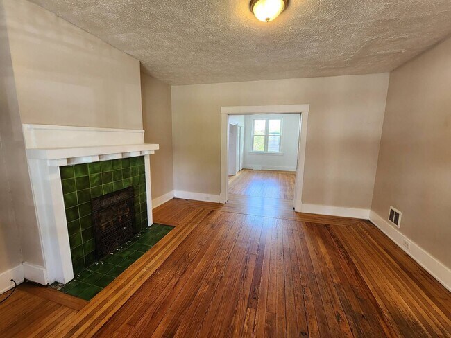 Building Photo - AVAILABLE JUNE 2026 - 3 Bedroom, 2 Bath Home w/ Wood Flooring & Fenced-in Yard!!!