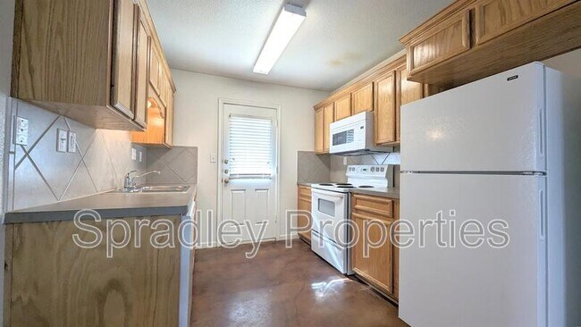 Building Photo - 5708A Luxor Dr