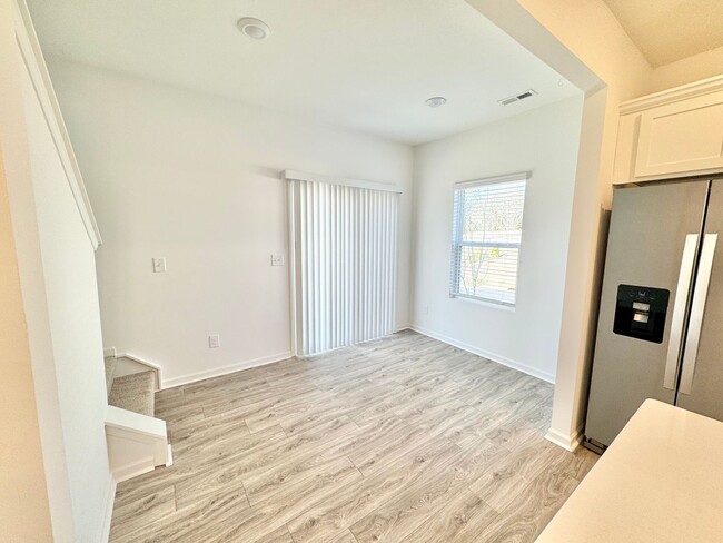 Building Photo - Ready June 6th! Two bedroom townhome in Lo...