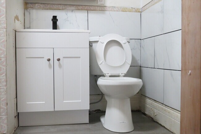 New toilet and vanity - 928 Burnet Ave