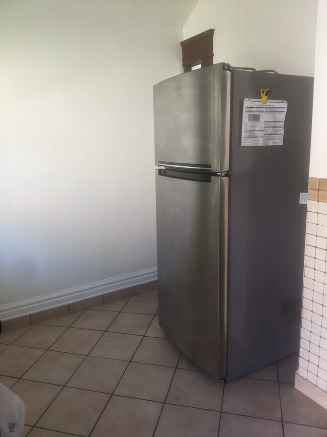 refrigerator & eating nook area - 2559 1/2 Pasadena Ave