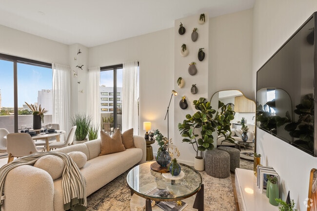 2 habitaciones, 2 baños - 922 pies cuadrados - Sala de estar - Lumaire West Palm Beach