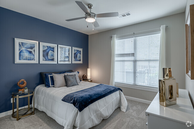 2BR, 2BA - 1,137SF - Primary Bedroom - The Promenade Apartments at Pinnacle Hills