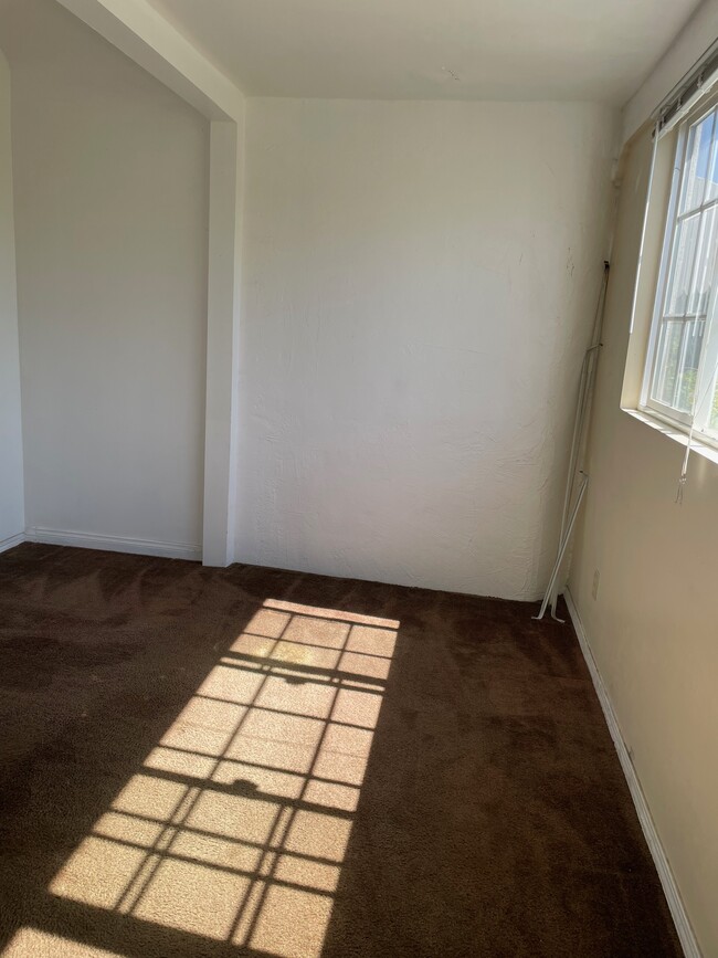 Bedroom hardwood /no carpet - 1203 S Sycamore Ave