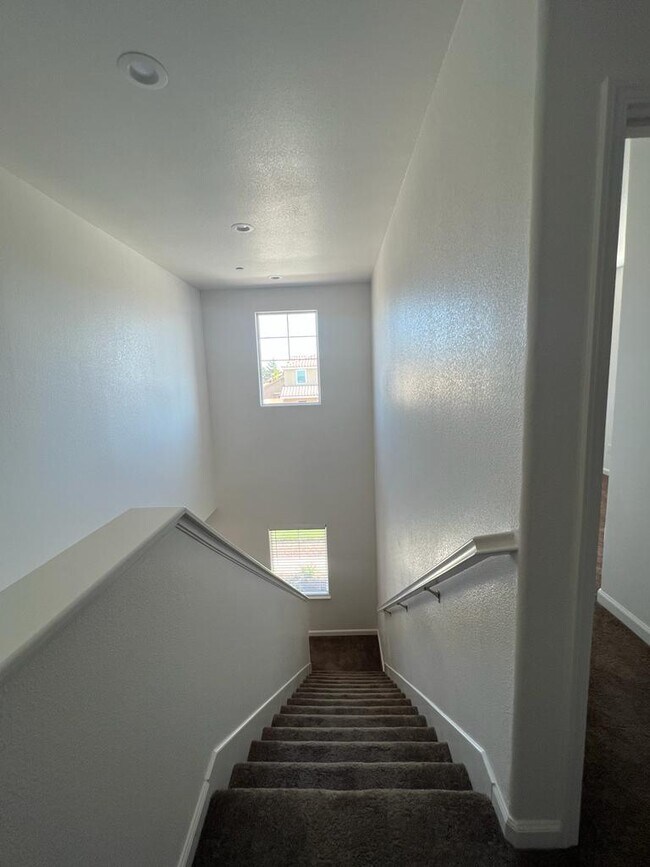 Building Photo - Welcome to modern living in a secure, gated community!