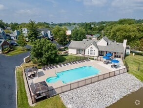 Sparkling Pool with Sundeck and Grill Area - Windridge Townhomes