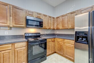 Building Photo - 6788 Manotak Oaks Dr
