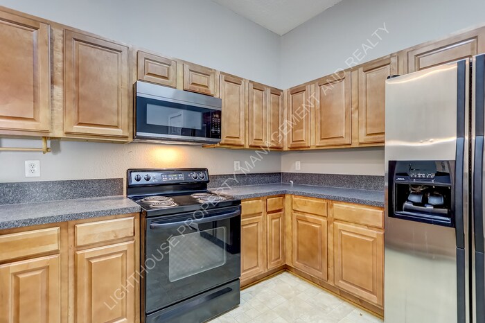 Foto principal - 6788 Manotak Oaks Dr