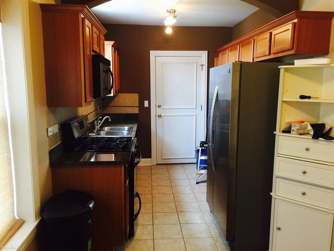 Building Photo - 1 br, 1 bath  - 4860 W Warner Ave Apt 1