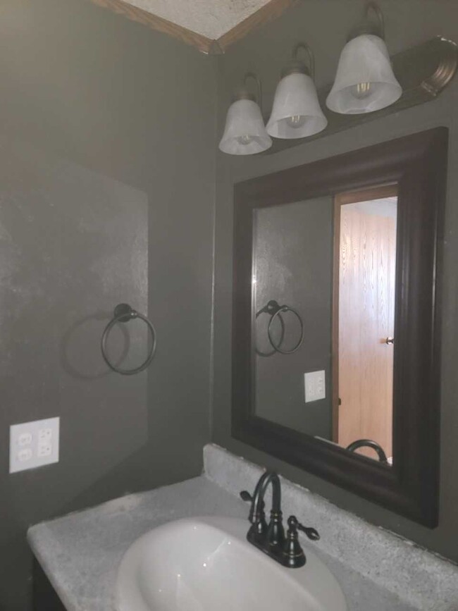 Baño - Woodcrest Apartments