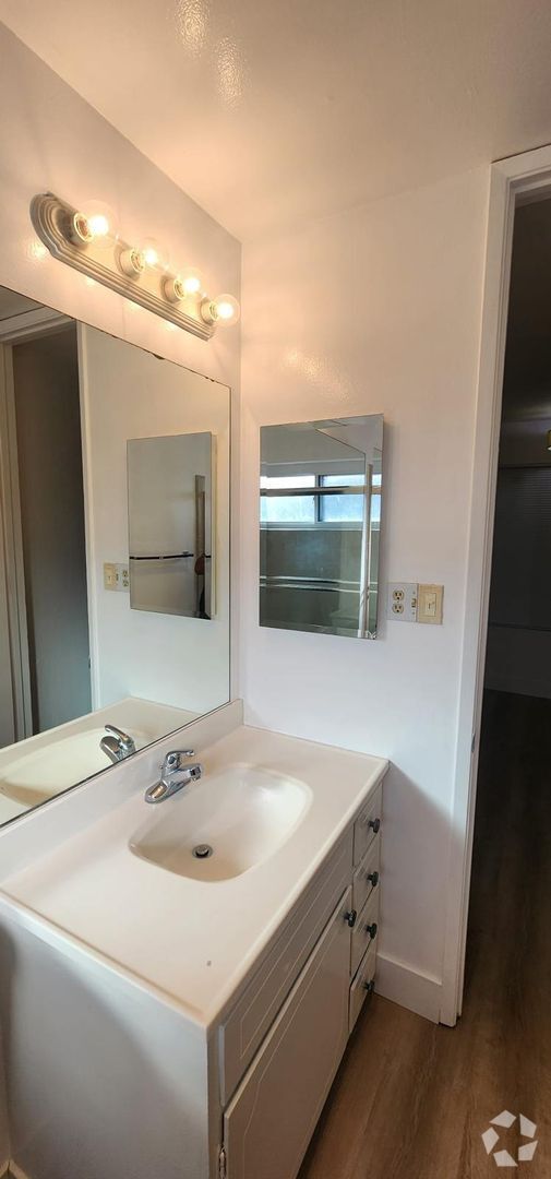 Building Photo - Apartment in San Carlos Creek-Side Views A...