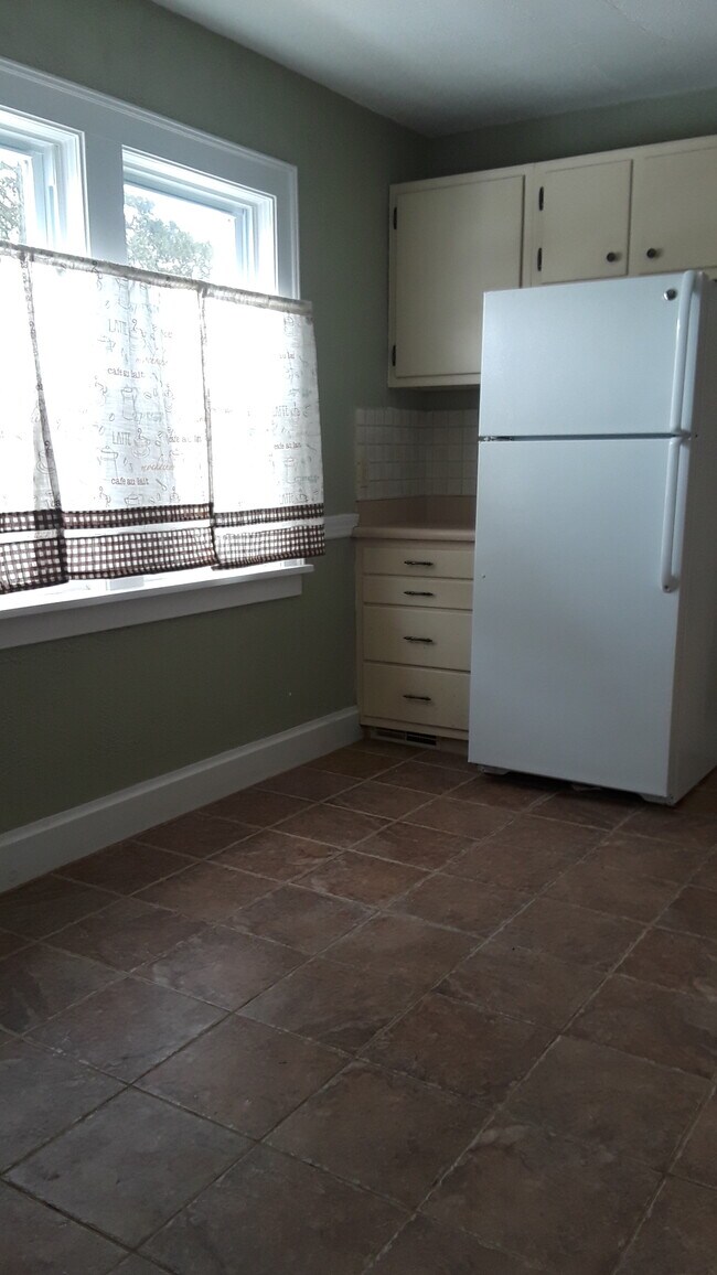 Kitchen with newer appliances - 414 S Highland Ave