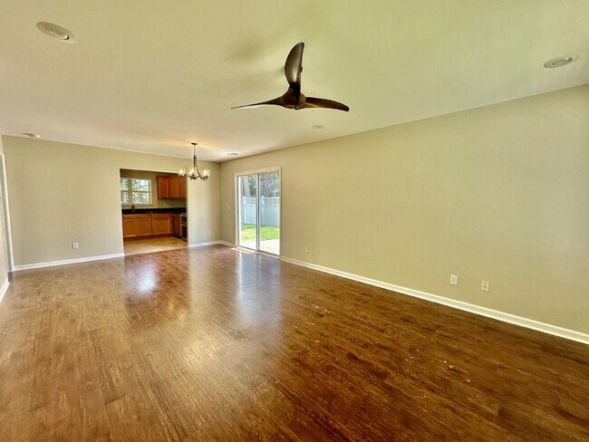 Building Photo - Four Bedroom Home with Private Fenced Back Yard in the Farm!