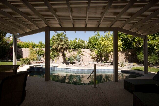 Building Photo - 38625 Desert Mirage Dr