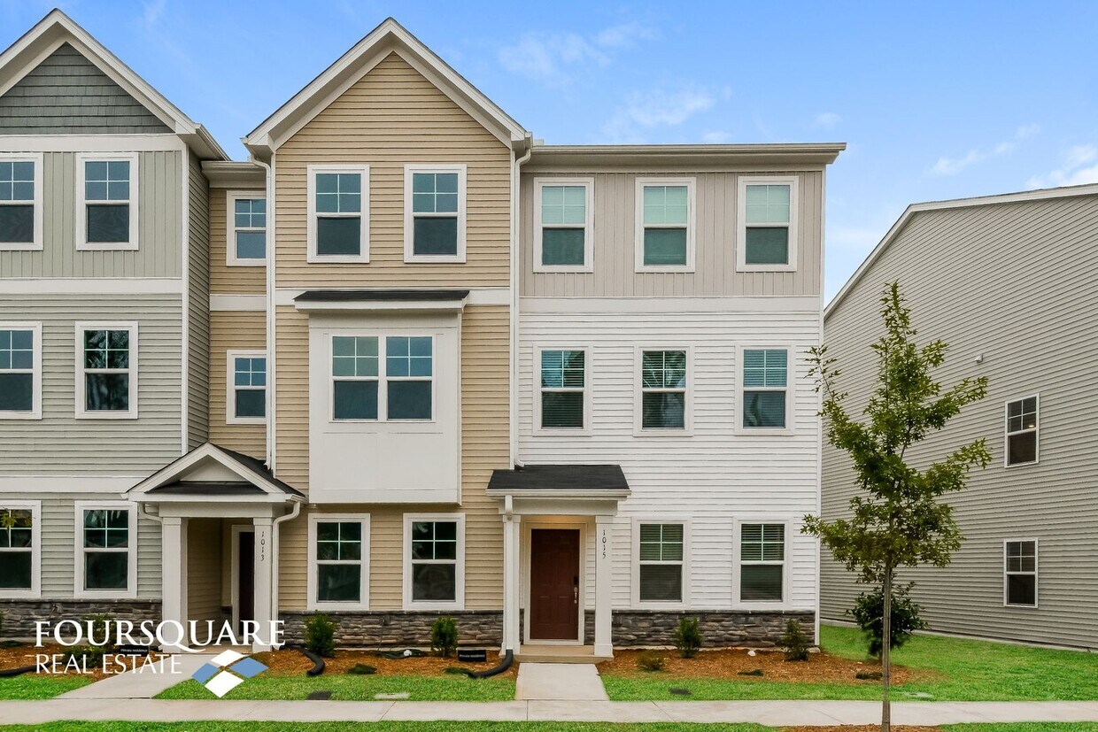 Primary Photo - Modern 3-Story Townhome with First-Level B...