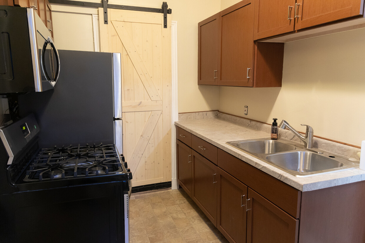 Newly renovated kitchen cabinets and countertop - 53 Huron Ave