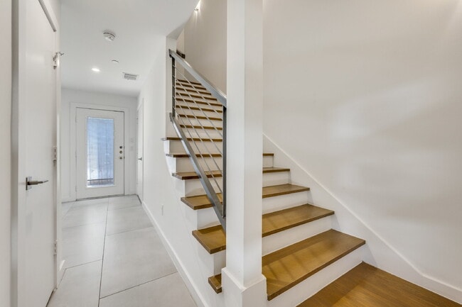 Building Photo - Live Above It All | Sleek Multi-Level Condo with Private Rooftop Deck