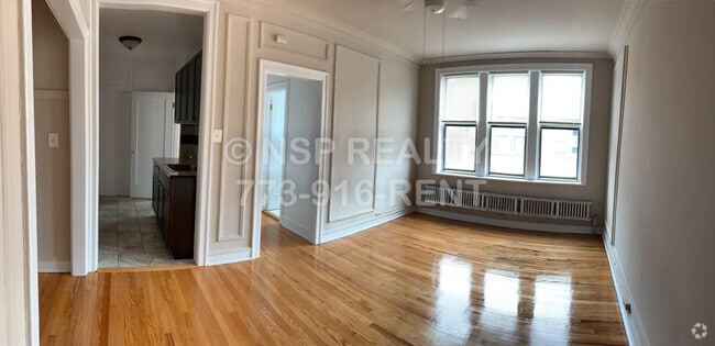 Building Photo - 1371 W Estes Ave