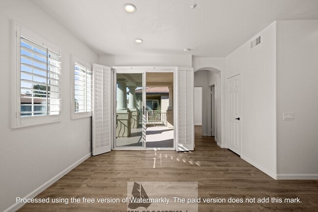 Building Photo - Welcome to this stunning 2-bedroom condo in gated community