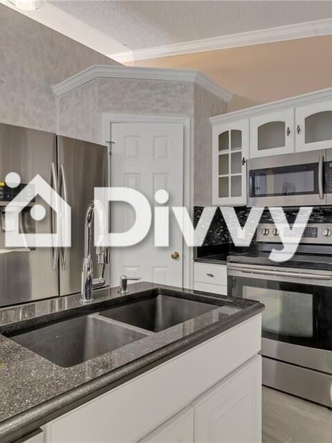 Foto del edificio - 390 Greenwich Ct, Kissimmee, FL 34758