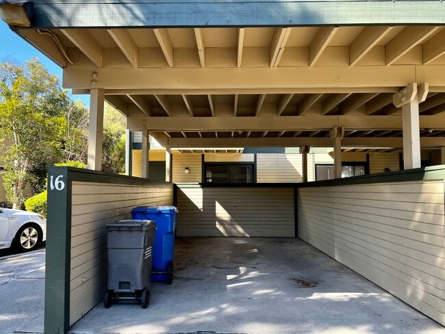 One covered parking and one reserved. Plus, open spaces. - 3335 Broad St