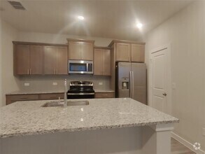 Building Photo - 1600 Mexican Heather Dr